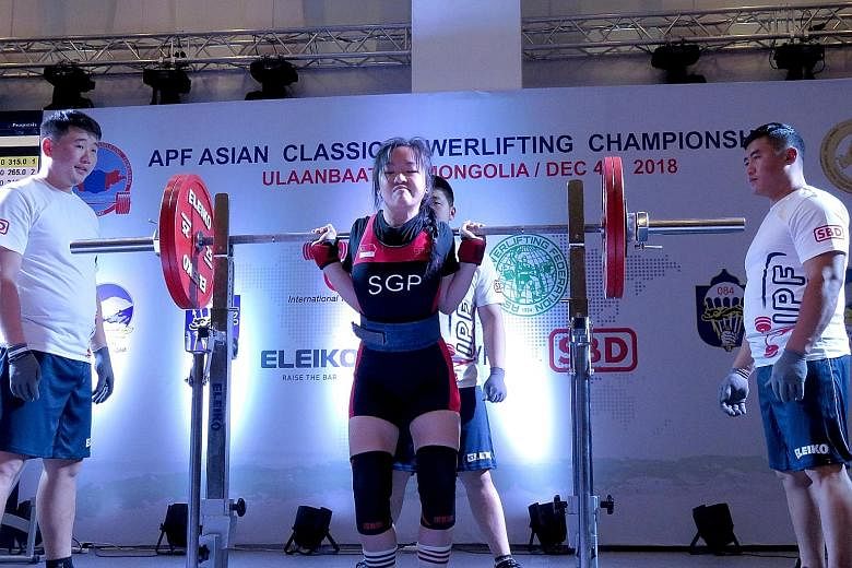 Farhanna Farid (left), weighing below 52kg, broke the Asian record thrice, ending with a 173kg dead lift in Ulaanbaatar, while Thor Qian Qi, in the U-52kg junior class, managed a 130kg squat.