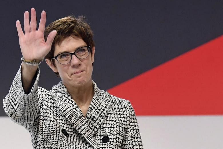 Mrs Annegret Kramp-Karrenbauer has promised to stick closely to the centrist course, insisting that the weakened CDU needs to position itself as "the people's party in the middle".