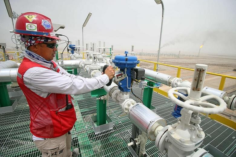 Degassing station facilities at the Zubair oil and gas field north of the southern Iraqi province of Basra. Opec members reached an agreement to cut oil production last Friday, which is a welcome development for financial markets, according to FXTM resear