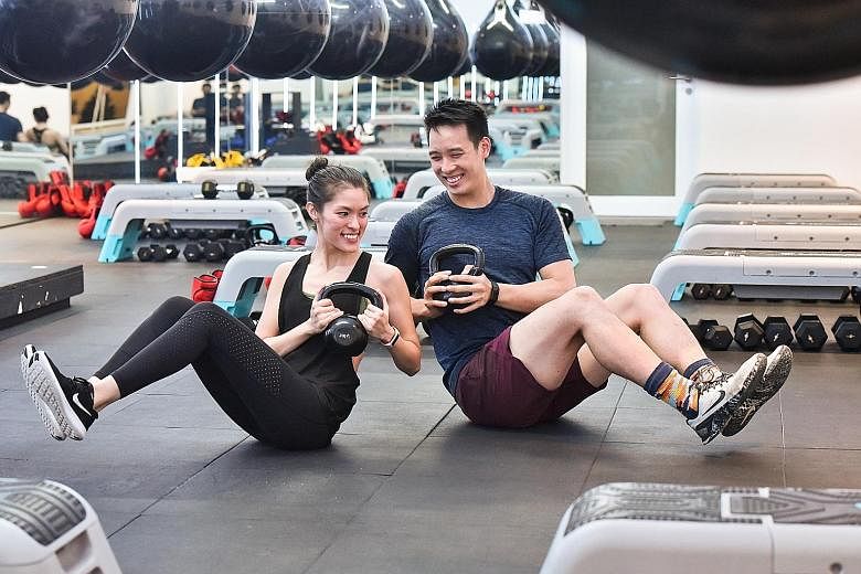 Ms Victoria Martin-Tay has a master's degree from Harvard University, but she quit the engineering field to start fitness and boxing studio bo0m with her husband Bryan Tay, a Princeton University graduate and former Singapore national swimmer, in Feb