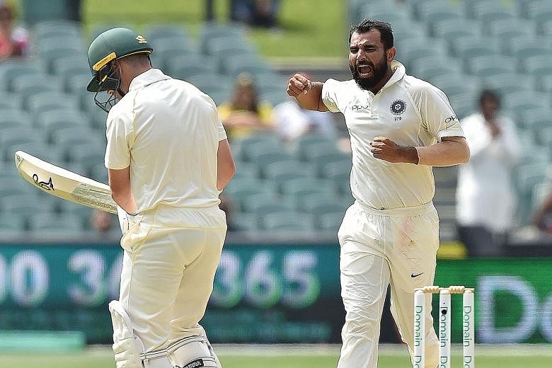 India's fast bowler Mohammed Shami celebrating dismissing Australia's opener Marcus Harris on day four of the first cricket Test at the Adelaide Oval. The hosts are 219 runs short of victory with six wickets left.