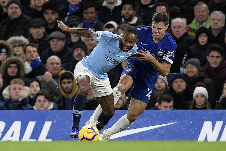 Raheem Sterling being challenged by Chelsea's Cesar Azpilicueta at Stamford Bridge, where he claimed he was abused while retrieving the ball.