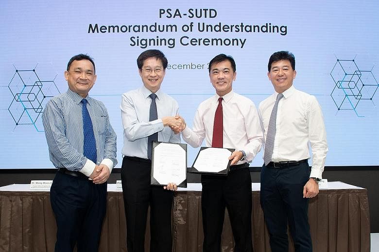 (Pictured from left) Dr Wong Woon Kwong, director of research and industry collaborations at SUTD; Professor Chong Tow Chong, SUTD president; Mr Ong Kim Pong, PSA's regional chief executive for South-east Asia; and Mr Ng Kok Cheong, PSA's head of hum