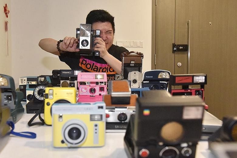 Mr Brandon Ong has about 70 instant cameras, some of which are displayed in his bedroom.