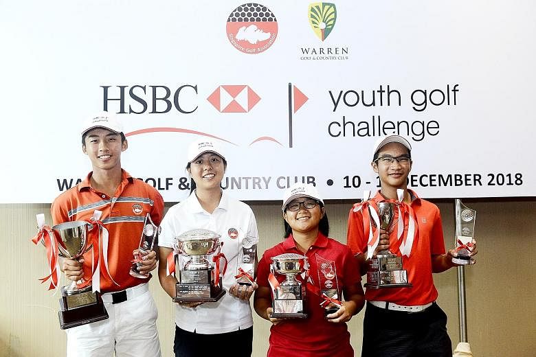 The second leg of the HSBC Youth Golf Challenge 2018 concluded at Warren Golf and Country Club yesterday, with Singapore Golf Association (SGA) development squad members Sean Lee (left) and Inez Ng (second from left) winning the boys' and girls' A di
