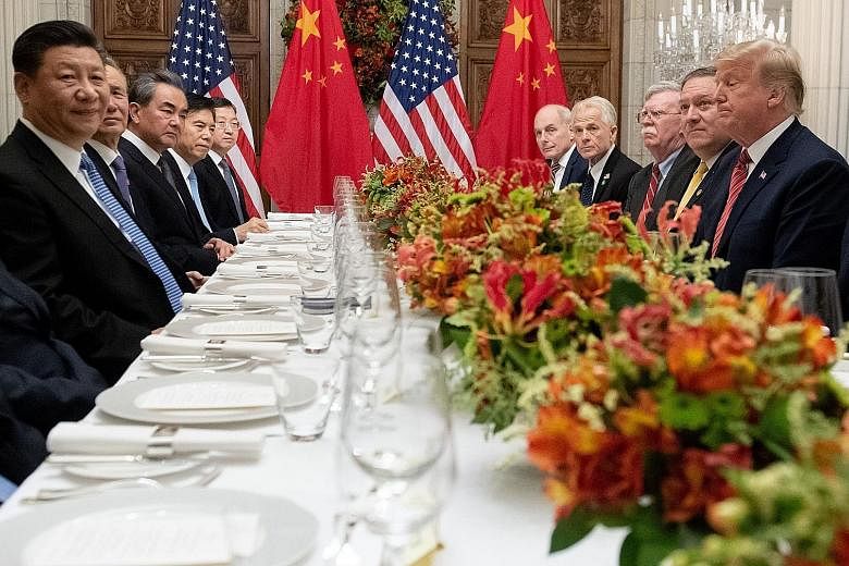 Chinese President Xi Jinping, United States President Donald Trump and their respective delegations during dinner at the end of the Group of 20 summit in Buenos Aires, Argentina, on Dec 1.