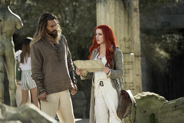 Jason Momoa and Amber Heard star in Aquaman.