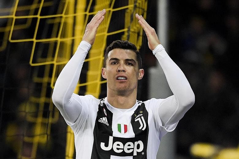 Cristiano Ronaldo rueing a missed chance in Juventus' 2-1 loss to Young Boys. But they still topped the group as Manchester United also lost.
