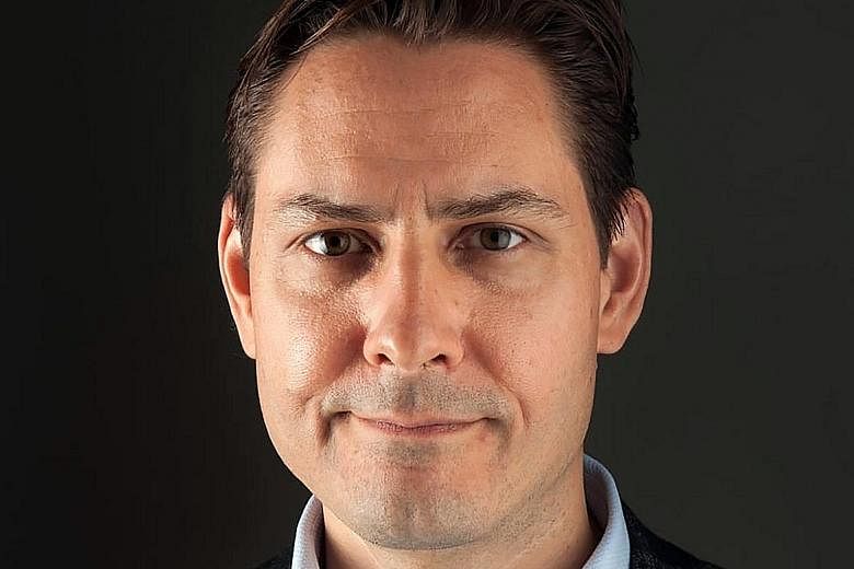 Former Canadian diplomat Michael Kovrig (top) was detained in Beijing on Dec 1, the same day that businessman Michael Spavor was held by officials from the national spy agency in Dandong.