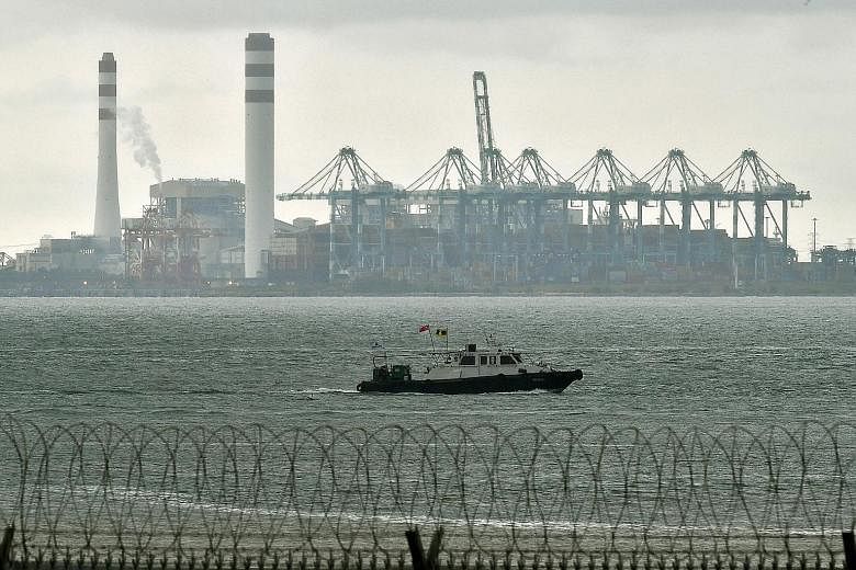 Tanjung Bin Power Plant and part of the Port of Tanjung Pelepas, a container terminal in Johor Baru, as viewed from Tuas West Drive. The United Nations Convention on the Law of the Sea governs all aspects of how the world's seas and oceans, and their