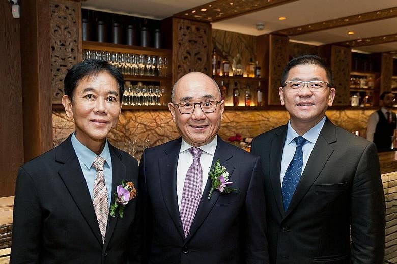 (From far left) BreadTalk founder and chairman George Quek, Din Tai Fung chairman Yang Chi-hwa and BreadTalk Group CEO Henry Chu at the opening of Din Tai Fung's first London branch on Dec 5. The group will open a second London branch in the middle o