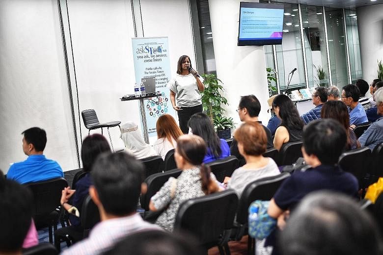 Straits Times senior education correspondent Sandra Davie speaking to 180 people at a talk at the National Library yesterday, under the askST@NLB series.