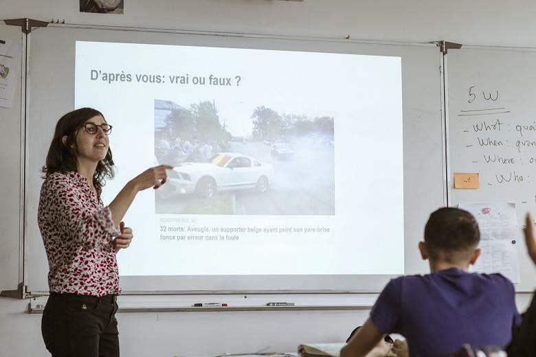 Ms Sandra Laffont, a journalist who helps train teenagers to recognise online misinformation, leading a workshop at College Henri Barbusse in Vaulx-en-Velin, France, last month.
