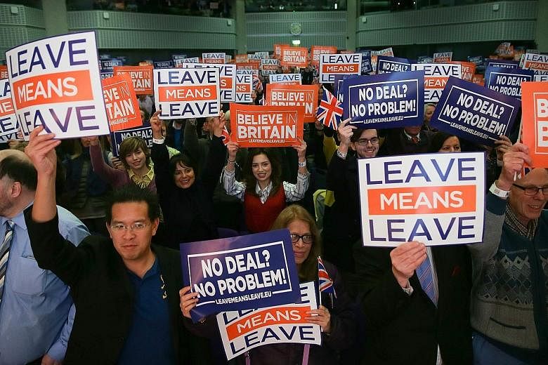 Members of the pro-Brexit Leave Means Leave group having their say at a political rally in central London last Saturday. EU leaders have refused to renegotiate the Brexit deal and several said the problem of its ratification could be resolved only by