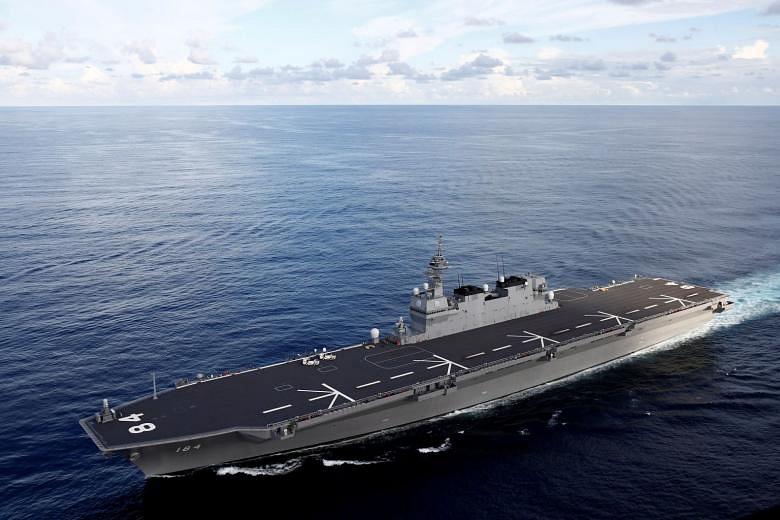 Japan gives nod to first aircraft carriers since WWII, says move does ...