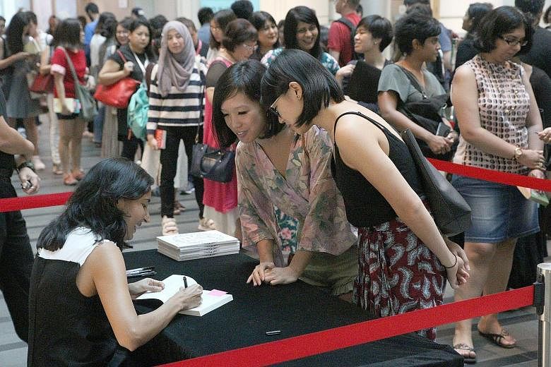 Indian author Kiran Desai (left) at her book signing during the Singapore Writers Festival last month.