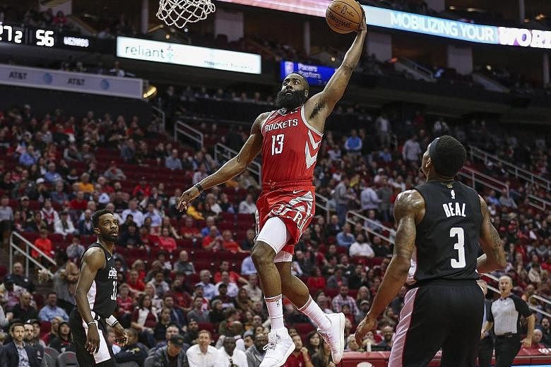 Houston Rockets guard James Harden taking off for two of his 35 points in his team's 136-118 win over the Washington Wizards at Toyota Centre. He also scored six three-pointers as Houston won their fifth straight.