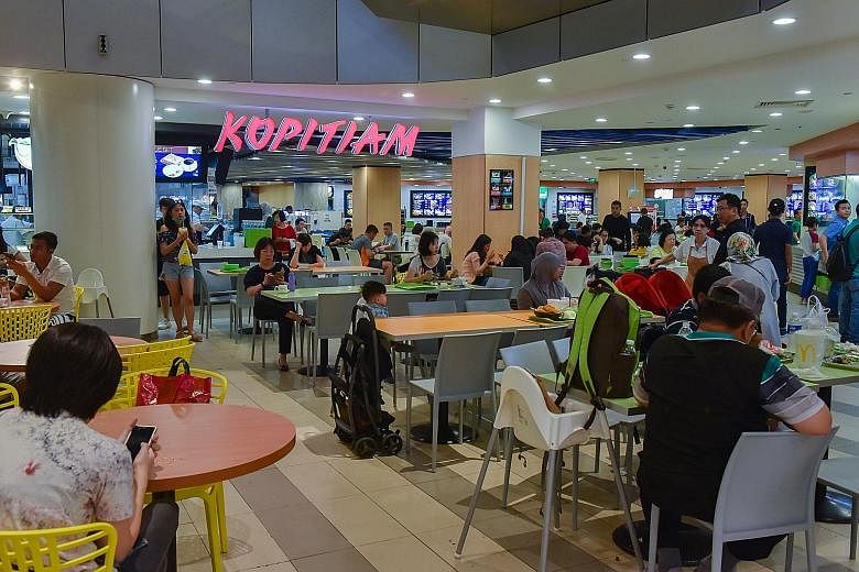 The Kopitiam foodcourt in VivoCity. NTUC Enterprise's promise to make affordable food more widely accessible with its expanded stable of outlets may be a tall order, say observers. The price of food, they say, is tied closely to its biggest operating