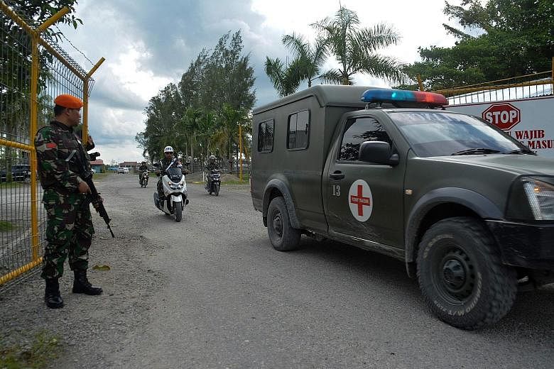 An Indonesian military ambulance evacuating the body of a soldier killed by rebels in Papua province earlier this month. Indonesia annexed the mineral-rich region in 1969 with a United Nations-backed vote that was widely seen as a sham.