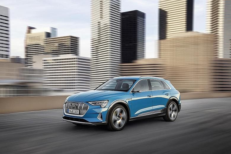 The Audi e-tron has some bespoke exterior features, such as a semi-blanked grille, pronounced fender bulges and wide rocker panel profiles along its flanks.