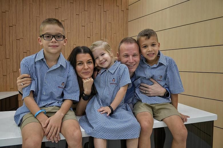 Mr Gergely Varadi and his wife Mariann, 33, with their children (from left) Leo, eight; Bella, four; and Bruno, seven. The children attend Middleton International School in Tampines.