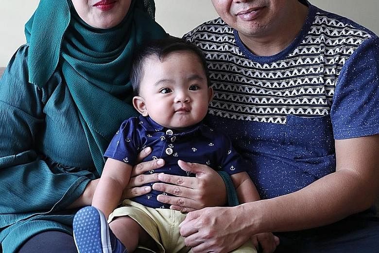 Ms Ayunina Banez with her husband Aldillan Aman and their son Aariz Mikhail, who had ventricular septal defect. He is now healthy after going for surgery sponsored by Parkway Pantai's Life Renewed programme.