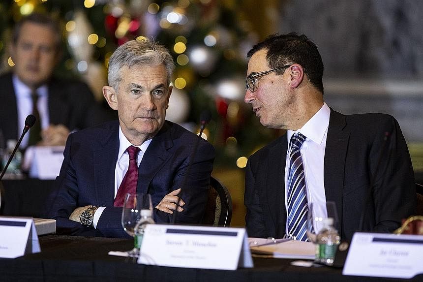 Wall Street is closely following reports that Mr Donald Trump has discussed firing Federal Reserve chairman Jerome Powell (left). Treasury Secretary Steven Mnuchin (right) said Mr Trump told him he had never suggested this.