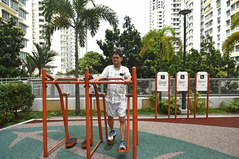Mr Kuek Chye Heng doing the exercises recommended by the National University Heart Centre, Singapore. Another exercise he gets - keeping up with his three-year-old grandson, whom he sees twice a week.