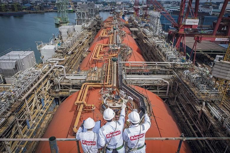 Keppel Offshore & Marine completed the world's first converted floating liquefaction vessel (right) last year. The company's subsidiary has been engaged to design and construct an ice-class liquefied natural gas bunker vessel by the fourth quarter of