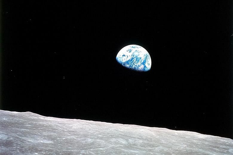 "Earthrise", the iconic photograph taken by astronaut William Anders aboard Apollo 8 on Dec 24, 1968. It inspired poet Archibald MacLeish to pen an essay in which he says: "To see the Earth as it truly is, small and blue and beautiful in that eternal