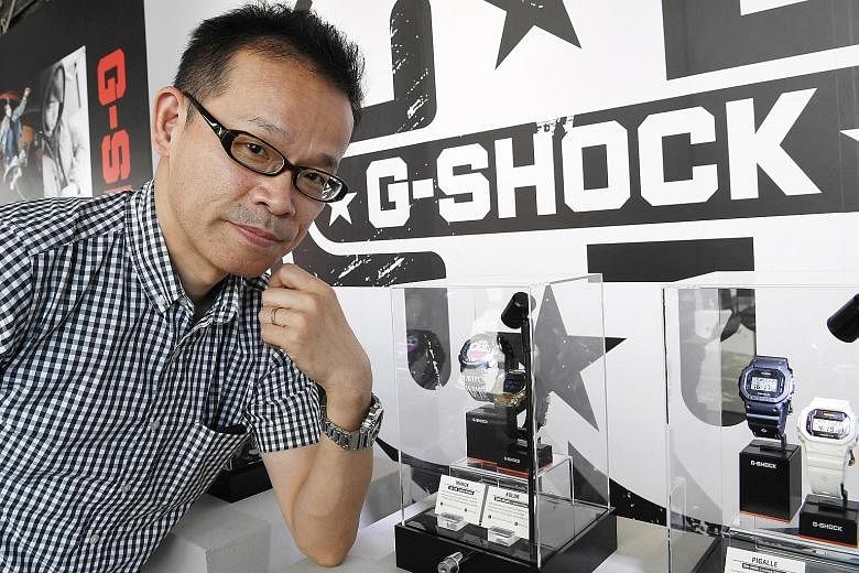 The special-edition GMW-B5000KL watch (above) commemorates the 35th anniversary of the popular Casio G-Shock. The F-91W (left) was the first watch designed by Mr Ryusuke Moriai (far left), the chief designer of the G-Shock.