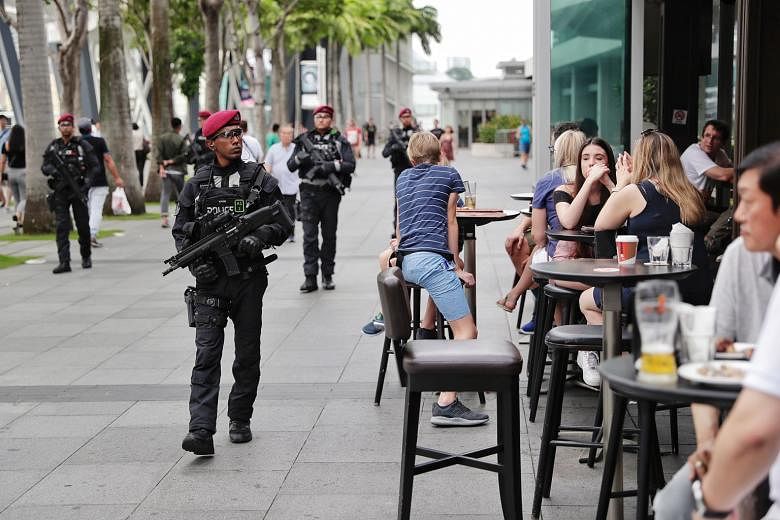 The Police Tactical Unit from the Special Operations Command (left) and officers from the Emergency Response Team (far left) will be part of the 700-strong security team deployed for this year's Marina Bay Singapore Countdown. In addition to boots on
