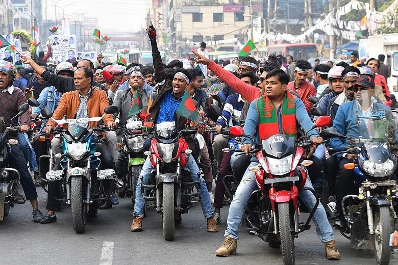 Supporters of Bangladesh's Awami League shouting slogans during a rally in Dhaka on Thursday.