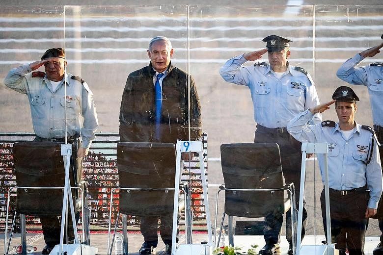 Israeli Prime Minister Benjamin Netanyahu at a graduation ceremony for fighter pilots at Hatzerim air base in the Negev desert on Wednesday, where he said Israel will not abide an Iranian entrenchment in Syria.
