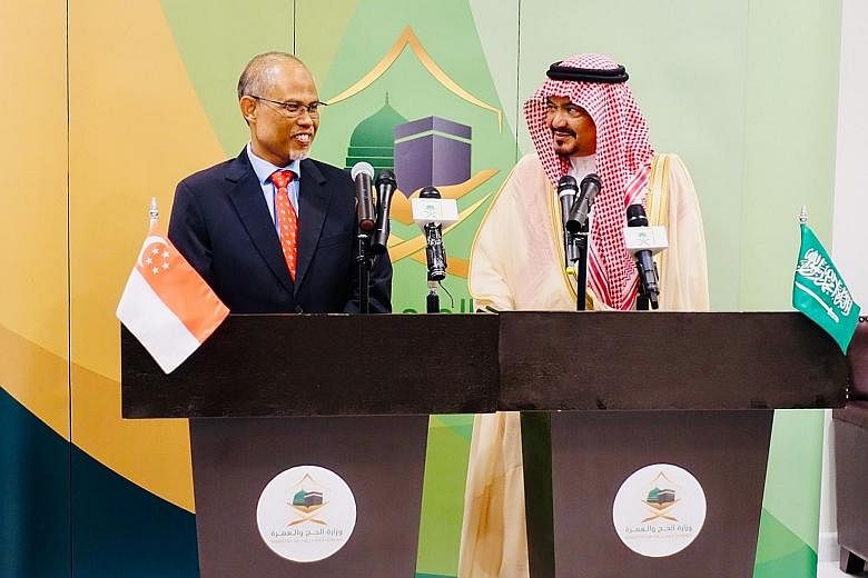 Minister-in-charge of Muslim Affairs Masagos Zulkifli with the Saudi Minister of Haj and Umrah, Dr Mohammed Saleh Taher Benten. Mr Masagos is currently in Saudi Arabia for the annual Haj Ministerial Meeting.