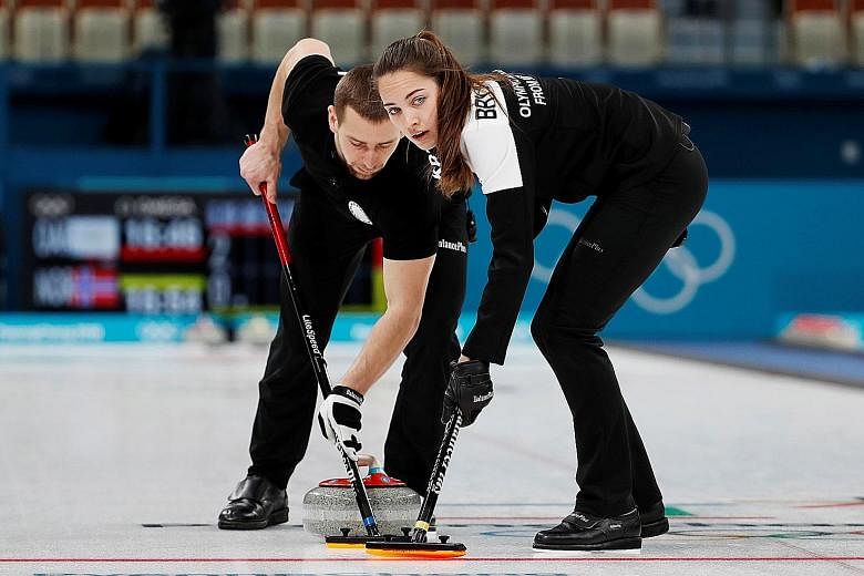 Russians Alexander Krushelnitsky and Anastasia Bryzgalova sweeping in the mixed-doubles curling at the Pyeongchang Olympics in February. He failed a doping test and they were stripped of their bronze medals.