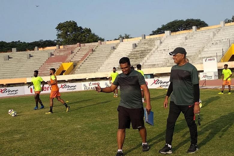 Singaporeans Akbar Nawas (holding file) and K. Balagumaran are head coach and assistant coach, respectively, of current I-League table-toppers Chennai City.