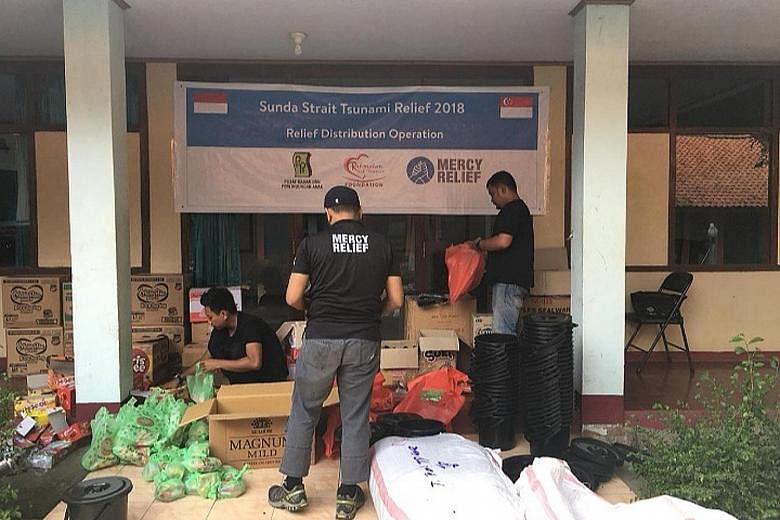 Singapore's humanitarian aid group Mercy Relief providing help in areas hit by the tsunami. It plans to distribute water and other supplies to those affected by the disaster. The devastation caused by the Dec 22 tsunami in Sumur district, which was t