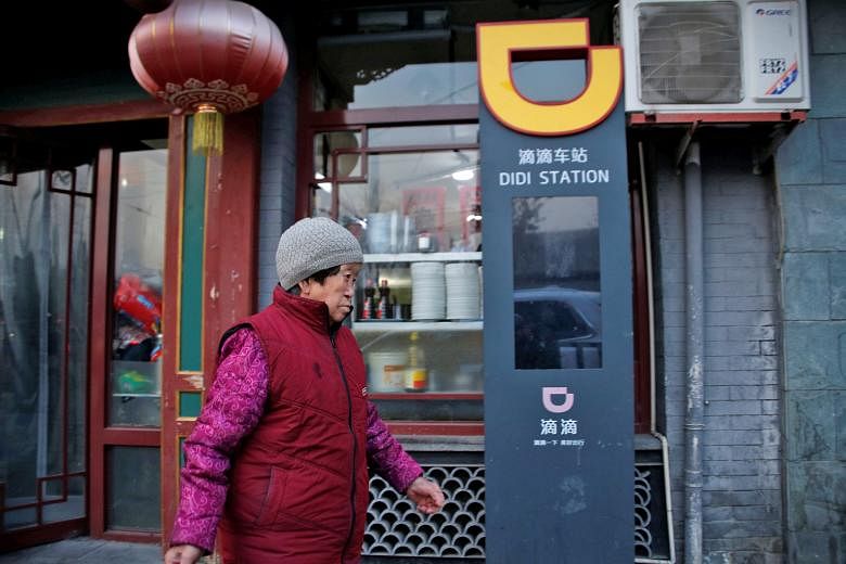 A Didi Chuxing ride-hailing stand in Beijing. The firm's new financial products bring it into competition with Alibaba Group and Tencent.