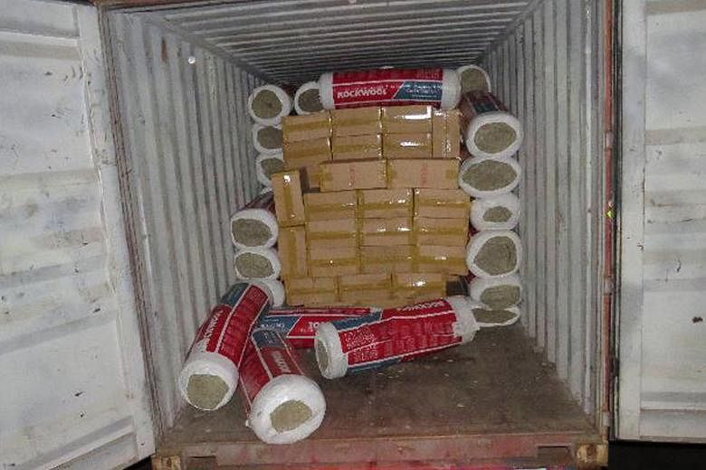 The authorities found 7,498 cartons and 16 packets of duty-unpaid cigarettes hidden among goods declared as rockwool.
