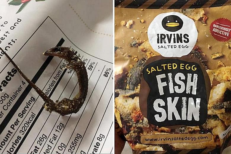 Customer Jane Holloway wrote in a Facebook post last Saturday that she found a dead lizard in her half-eaten salted egg fish skin packet.