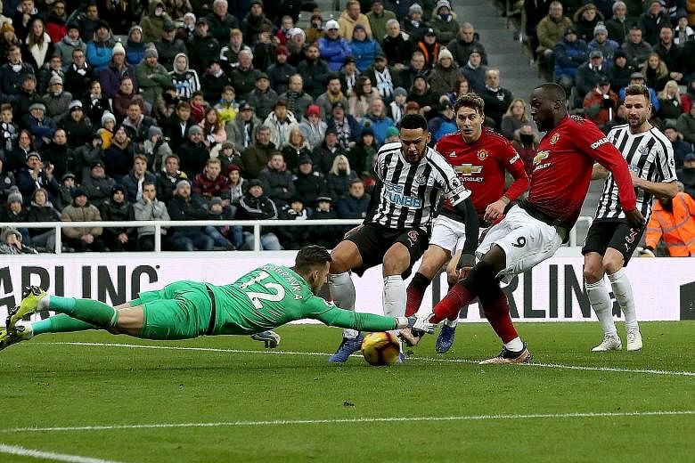 Romelu Lukaku beating Newcastle defender Jamaal Lascelles to the ball to score United's opener past Martin Dubravka at St James' Park. Marcus Rashford sealed the win which maintained Ole Gunnar Solskjaer's perfect start.