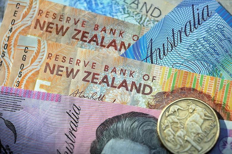 The Aussie dollar was back at US$0.7016, after a wild 24 hours saw it collapse almost three full cents to US$0.6715, while the kiwi dollar returned to US$0.6694, having been as low as US$0.6591 on Thursday.