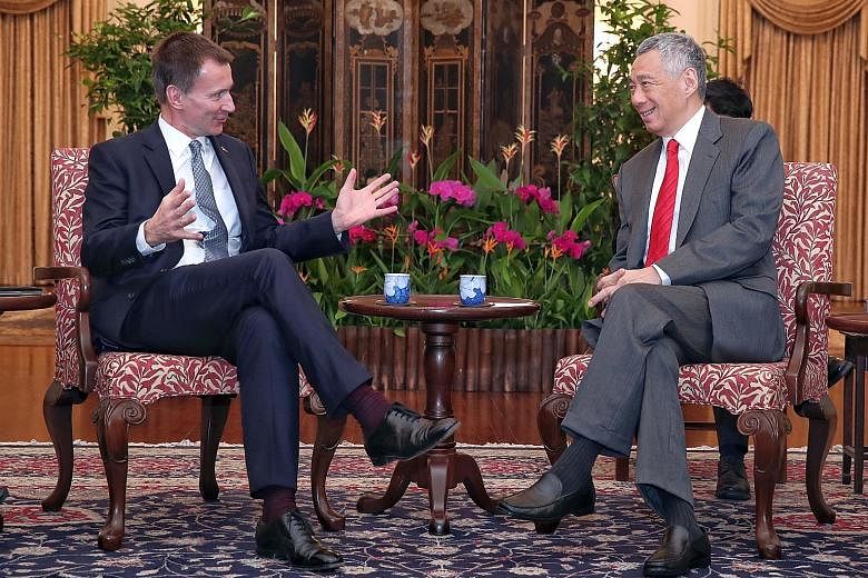 British Foreign Secretary Jeremy Hunt, who is here on an official visit, called on Prime Minister Lee Hsien Loong at the Istana yesterday. The two leaders reaffirmed the strong, growing and broad-based ties between Singapore and Britain.