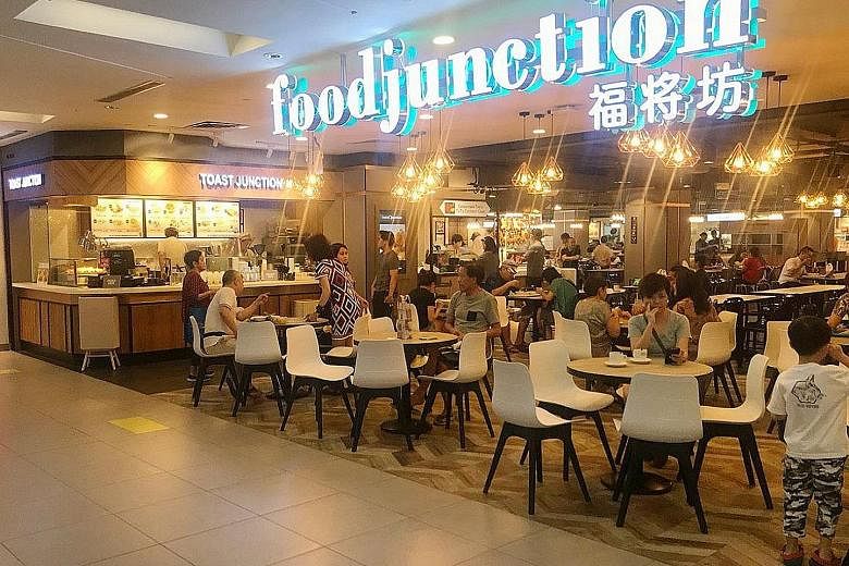 The Food Junction foodcourt at Nex. The chain takes some pains to make its foodcourts look chic and contemporary. Pillowy kueh from Chinatown Tan's TuTu Coconut Cake.