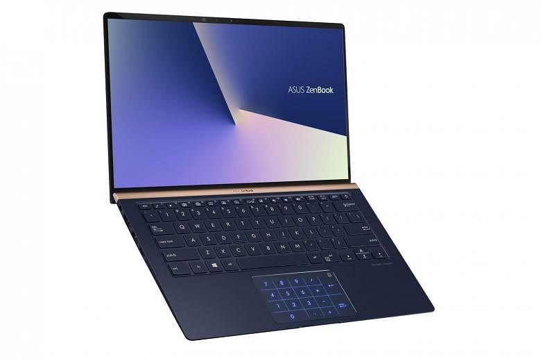 Tech review Asus adds clever numeric touchpad to ZenBook 14 The Straits Times