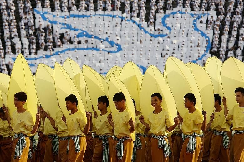 Dancers performing at the Olympic Stadium in Phnom Penh, Cambodia, to mark the 40th anniversary of the expulsion of the Khmer Rouge regime.
