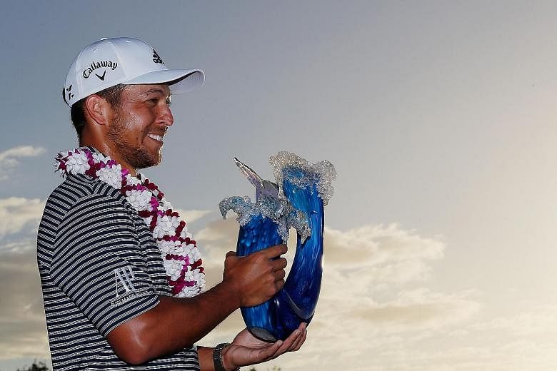 A joyous Xander Schauffele after winning the Tournament of Champions at the Plantation Course at Kapalua Golf Club in Hawaii.