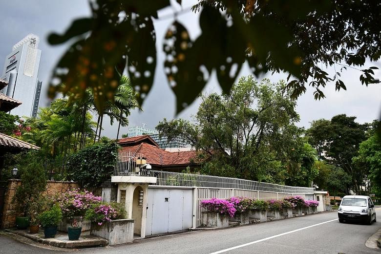 Mr Lee Kuan Yew's home at 38 Oxley Road. A clause on the demolition of the house, drafted for previous versions of the will but subsequently deleted, came to be reinstated in the last will.