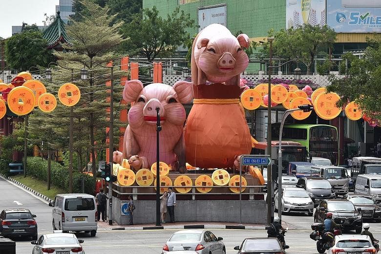 The lanternfeatures several pigs and a fu dai, or fortune bag in Mandarin. It and other lanterns at this year's Chinatown Chinese New Year light-up were designed by 11 students from the Singapore University of Technology and Design, and handmade by 4
